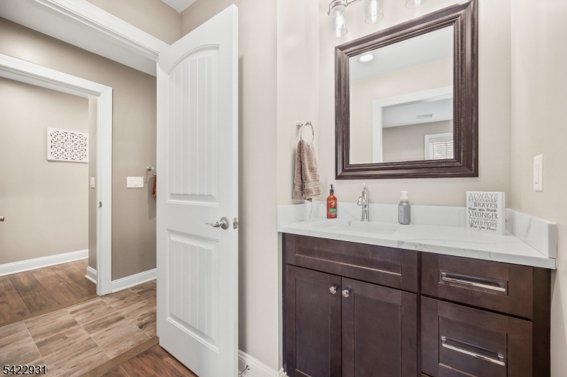 13 Fox Run Monroe Township, NJ 08831 - Photo 26 of 46 a bathroom with a granite countertop sink vanity and mirror