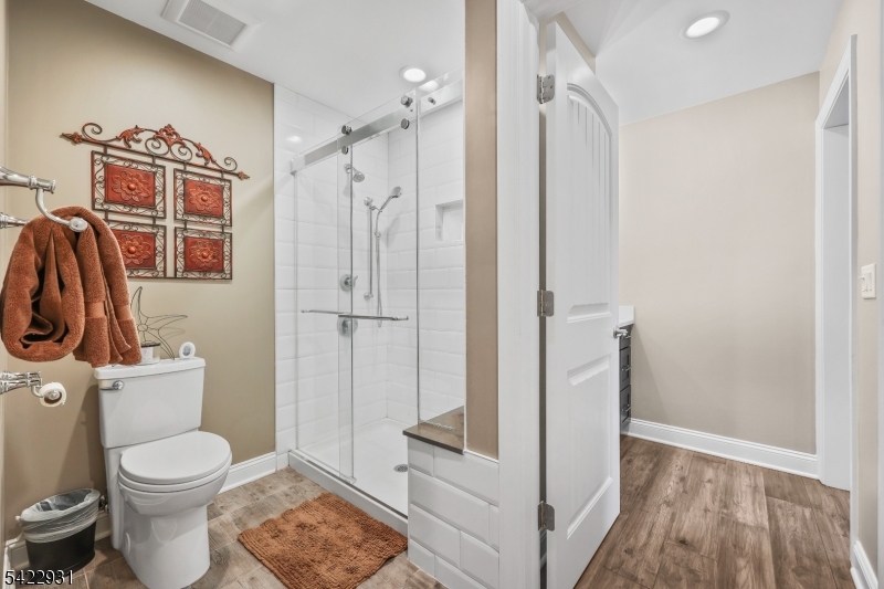 13 Fox Run Monroe Township, NJ 08831 - Photo 27 of 46 a bathroom with a toilet a sink and shower