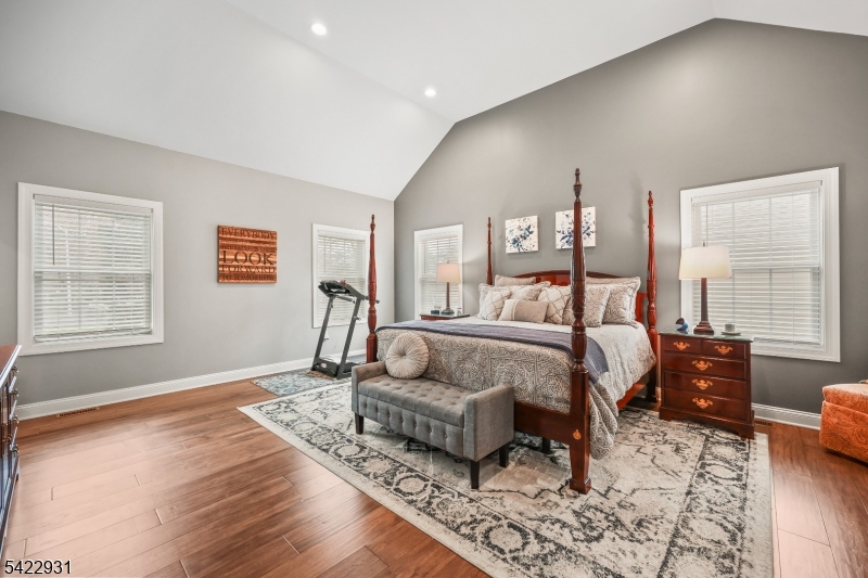 13 Fox Run Monroe Township, NJ 08831 - Photo 3 of 46 a bedroom with a bed and wooden floor