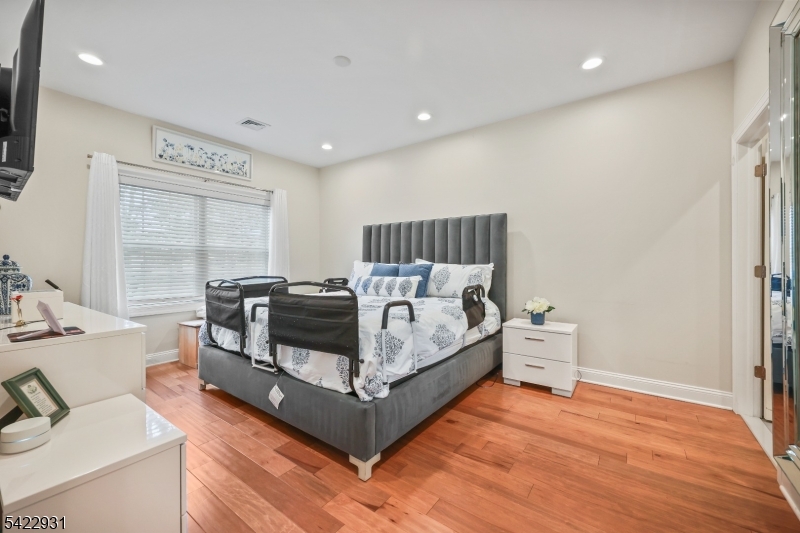 13 Fox Run Monroe Township, NJ 08831 - Photo 33 of 46 a bed room with a bed and a large window