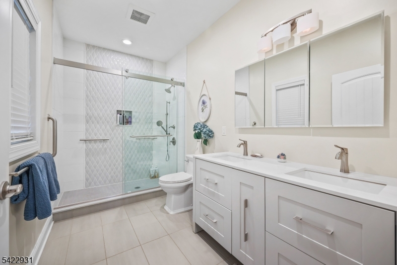 13 Fox Run Monroe Township, NJ 08831 - Photo 35 of 46 a bathroom with a granite countertop sink toilet and shower