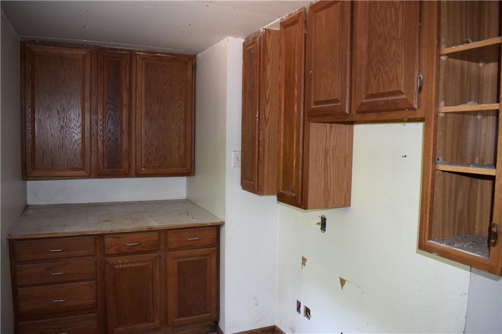 192 Millbrook Road Mercer, PA 16137 - Photo 8 of 13 a bathroom with a sink and a cabinet