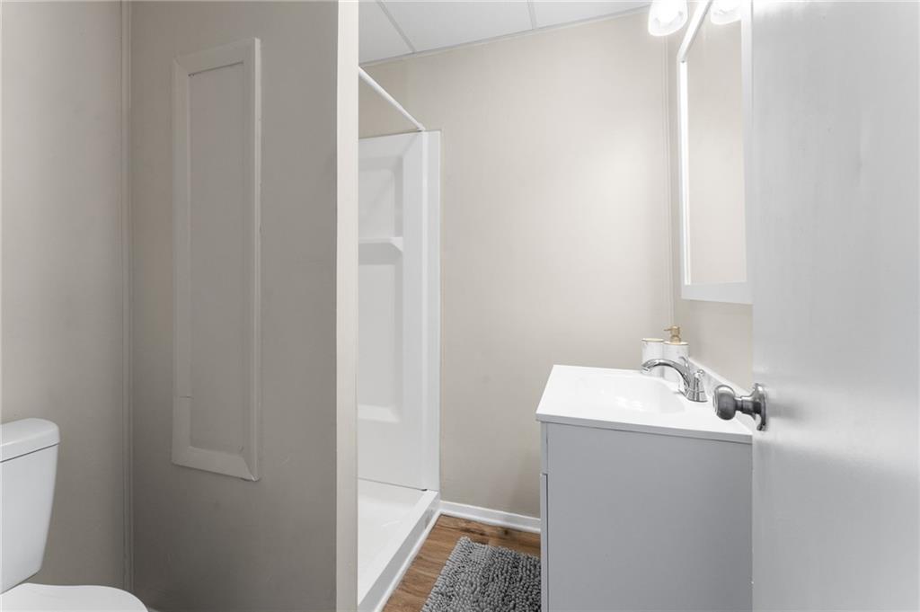 523 Cross Street Rochester, PA 15074 - Photo 12 of 41 a bathroom with a sink toilet and vanity
