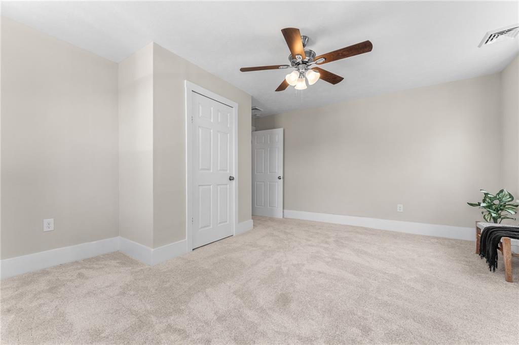 523 Cross Street Rochester, PA 15074 - Photo 27 of 41 a view of an empty room and chandelier fan