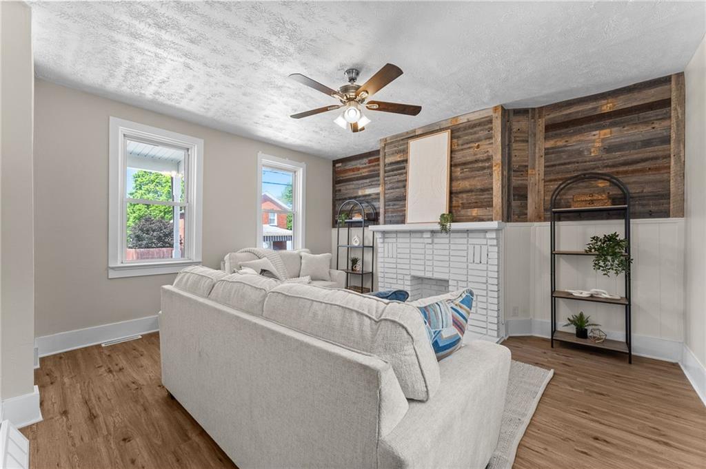 523 Cross Street Rochester, PA 15074 - Photo 5 of 41 a living room with furniture and a window