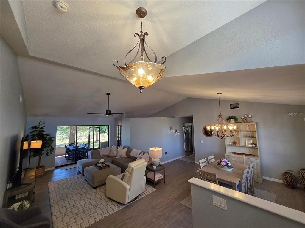 13 Seaward Circle Placida, FL 33946 - Photo 14 of 45 a living room with furniture and a chandelier
