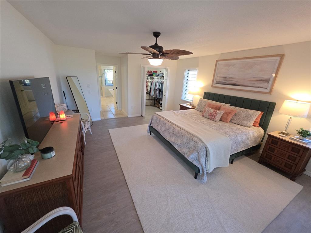 13 Seaward Circle Placida, FL 33946 - Photo 21 of 45 a bedroom with bed and a chandelier
