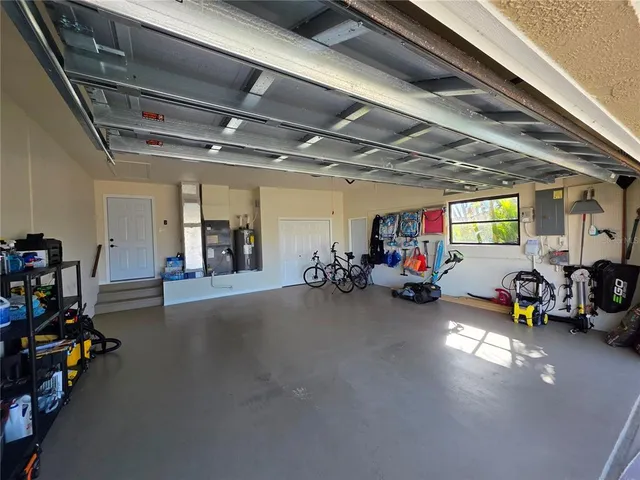 a view of a garage with a bike and wooden roof