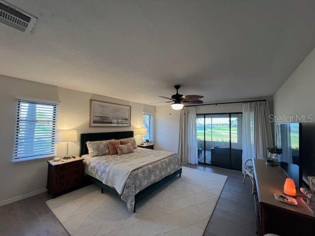13 Seaward Circle Placida, FL 33946 - Photo 5 of 45 a bedroom with a bed and a chandelier