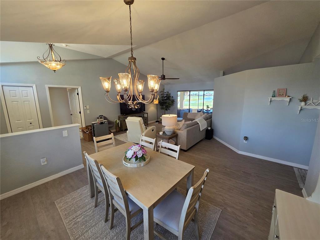 13 Seaward Circle Placida, FL 33946 - Photo 8 of 45 a view of a dining room with furniture and chandelier