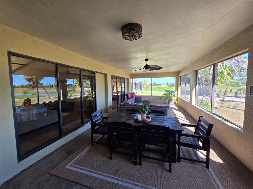 13 Seaward Circle Placida, FL 33946 - Photo 10 of 45 a view of a workspace with furniture and a window