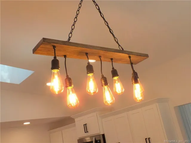 a bathroom with a chandelier