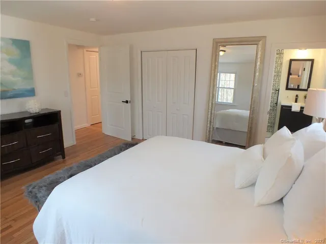 a bathroom with a toilet and shower