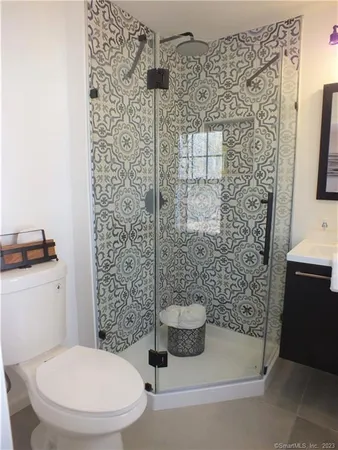 a bathroom with a bathtub and a sink