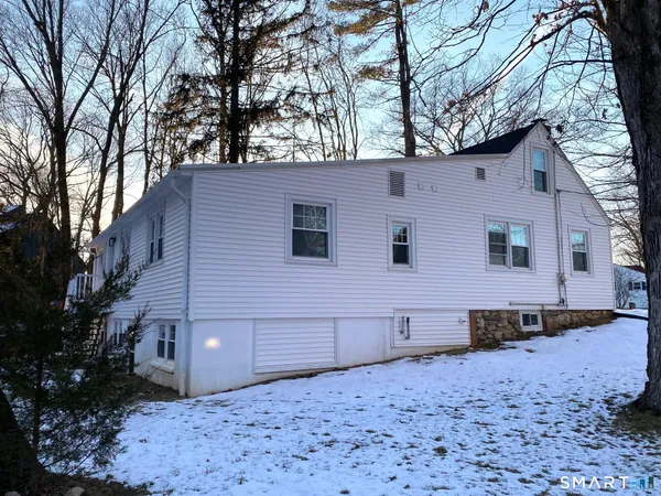 a house with trees in front of it