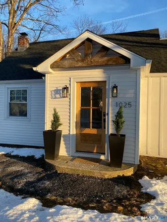 a front view of house with yard