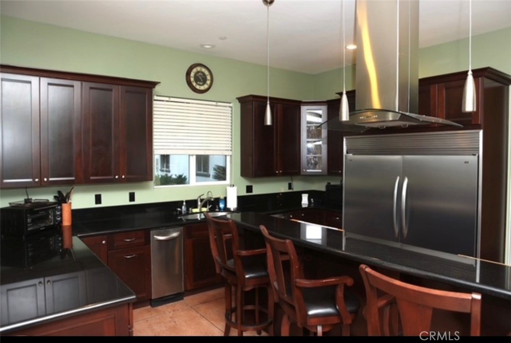 3200 San Fernando Road Atascadero, CA 93422 - Photo 12 of 45 a kitchen with stainless steel appliances granite countertop a sink stove and refrigerator