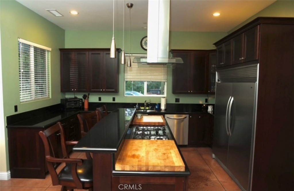 3200 San Fernando Road Atascadero, CA 93422 - Photo 14 of 45 a kitchen with refrigerator and window