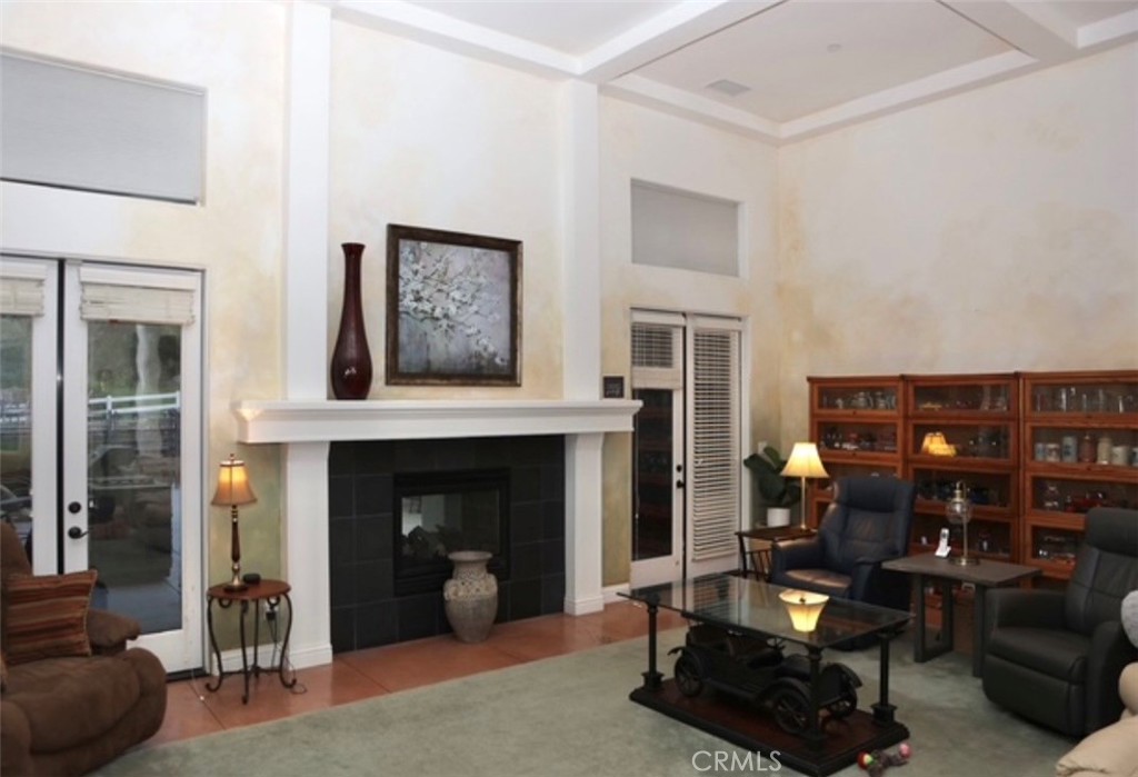 3200 San Fernando Road Atascadero, CA 93422 - Photo 20 of 45 a living room with furniture a fireplace and a large window