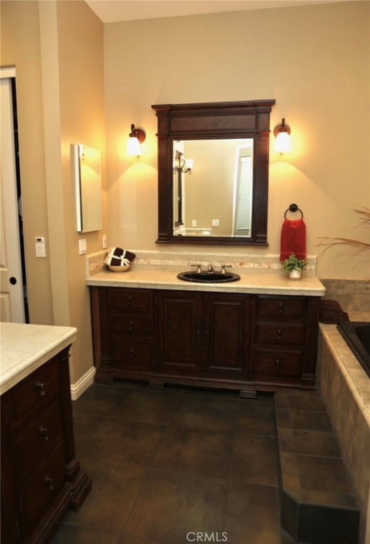 3200 San Fernando Road Atascadero, CA 93422 - Photo 31 of 45 a bathroom with a sink vanity and mirror