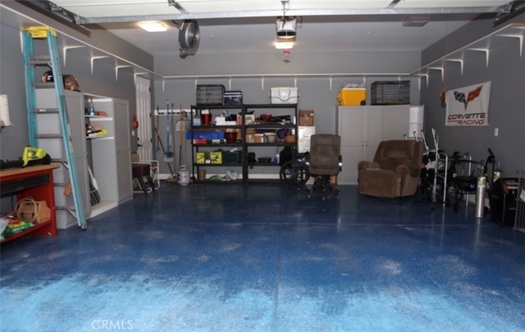 3200 San Fernando Road Atascadero, CA 93422 - Photo 32 of 45 a living room with lots of furniture and gym equipment