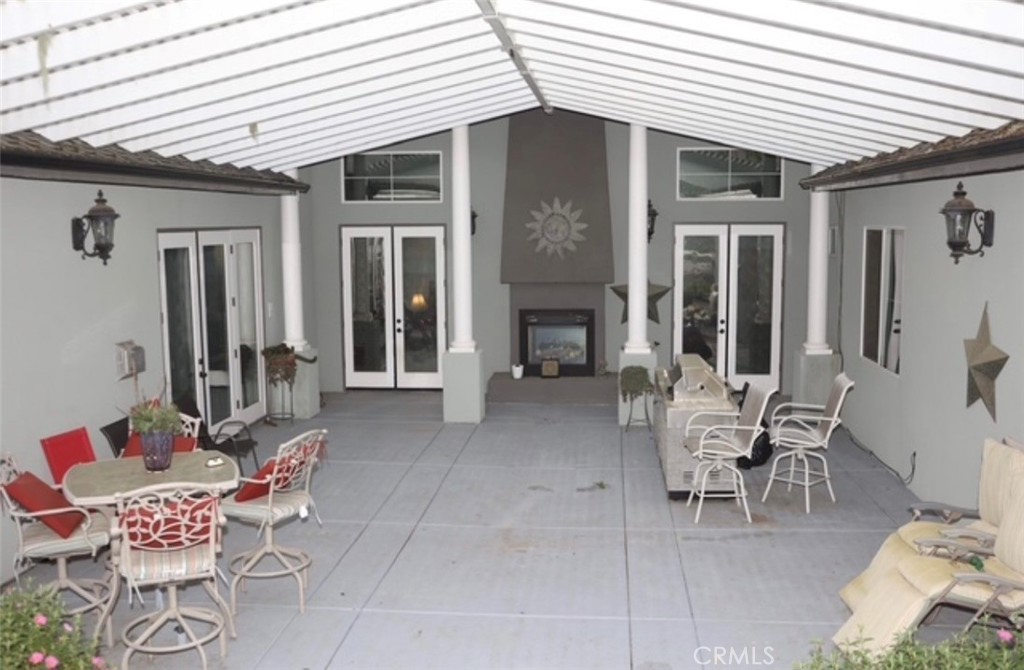 3200 San Fernando Road Atascadero, CA 93422 - Photo 33 of 45 a view of a patio with table and chairs and potted plants