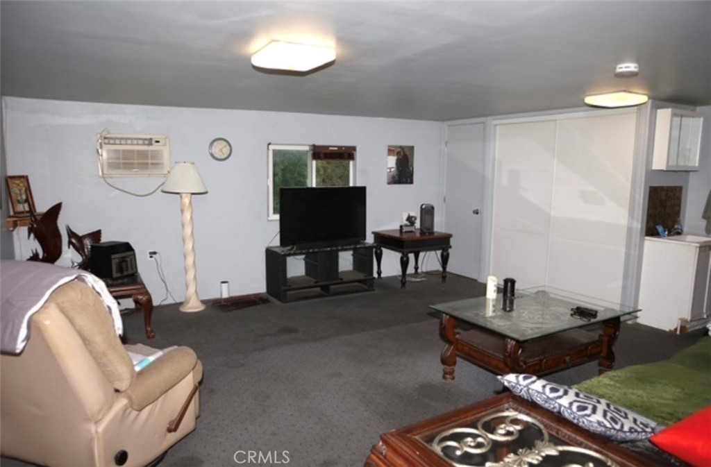 3200 San Fernando Road Atascadero, CA 93422 - Photo 41 of 45 a living room with furniture and a flat screen tv