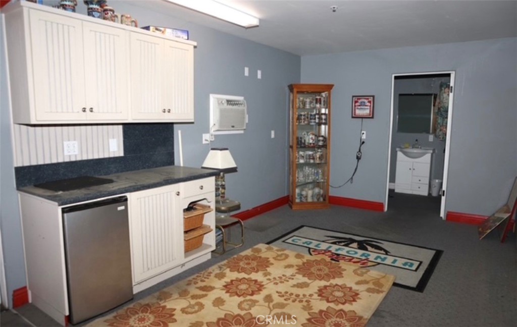 3200 San Fernando Road Atascadero, CA 93422 - Photo 44 of 45 a kitchen with white cabinets and sink