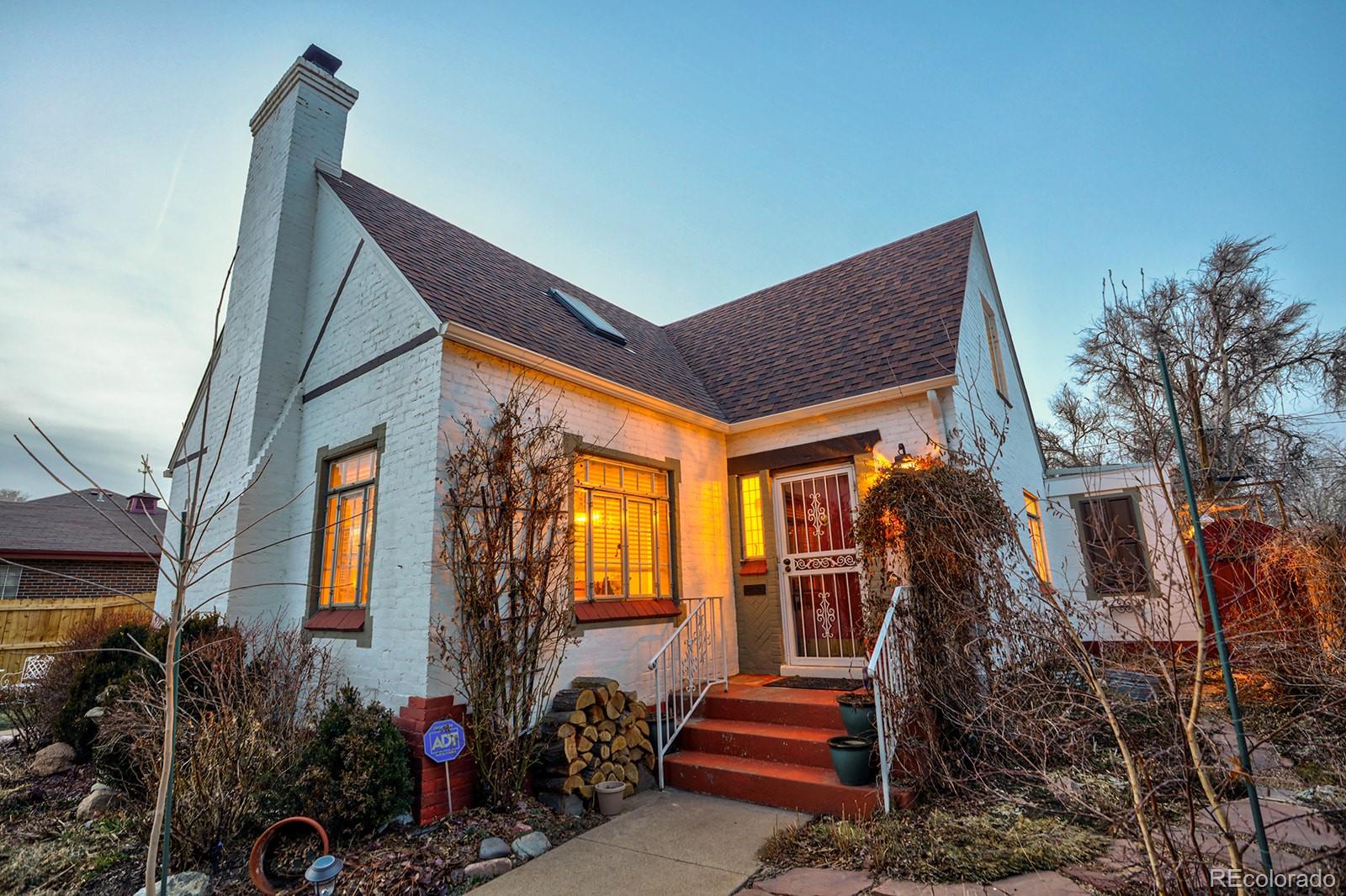 3917 Haddon Road Denver, CO 80205 - Photo 3 of 40 a backyard of a house with seating space