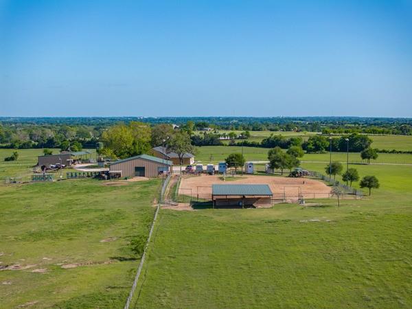 6808 Cedar Hill Road Brenham, TX 77833 - Photo 22 of 40 a view of a lake with a yard