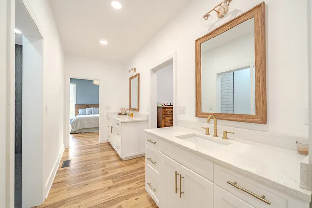 a bed room with a bed and a window