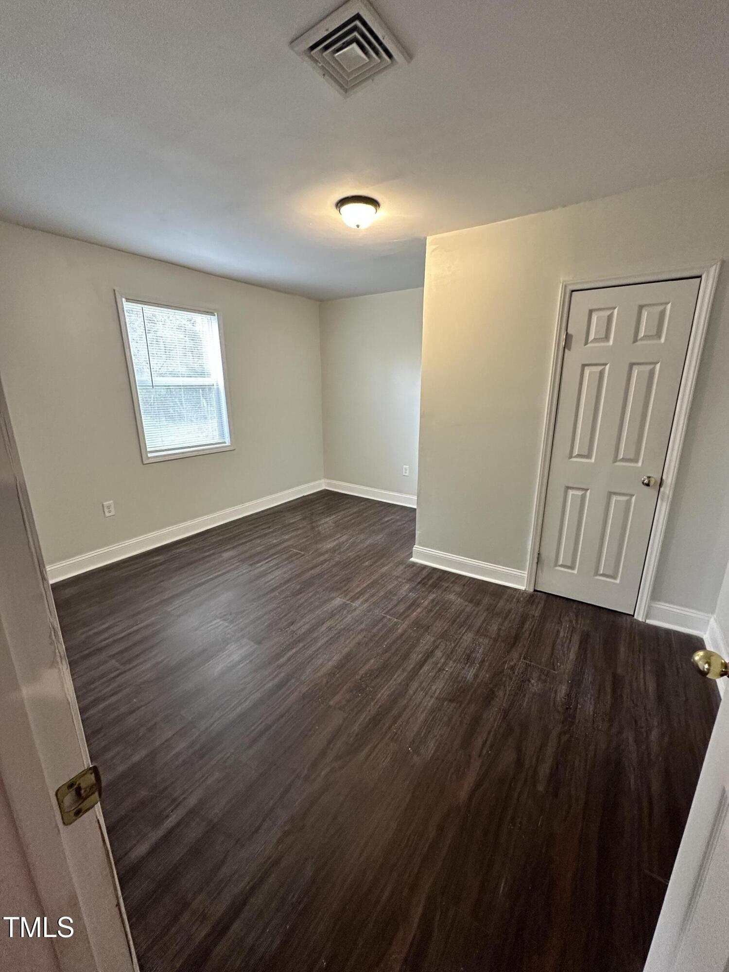 4989 Highway 217 Erwin, NC 28339 - Photo 12 of 14 wooden floor in an empty room