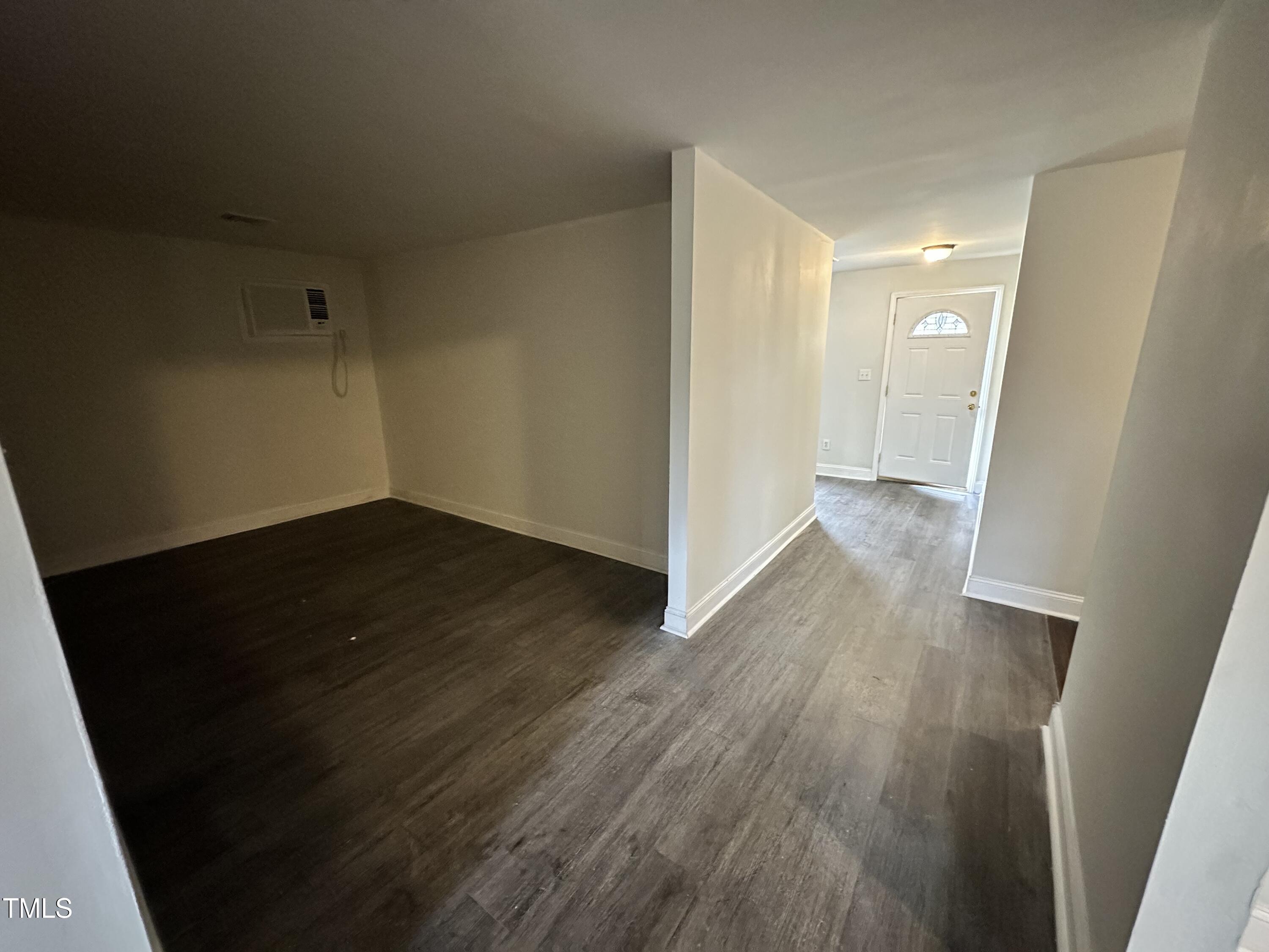 4989 Highway 217 Erwin, NC 28339 - Photo 8 of 14 wooden floor in an empty room with a window