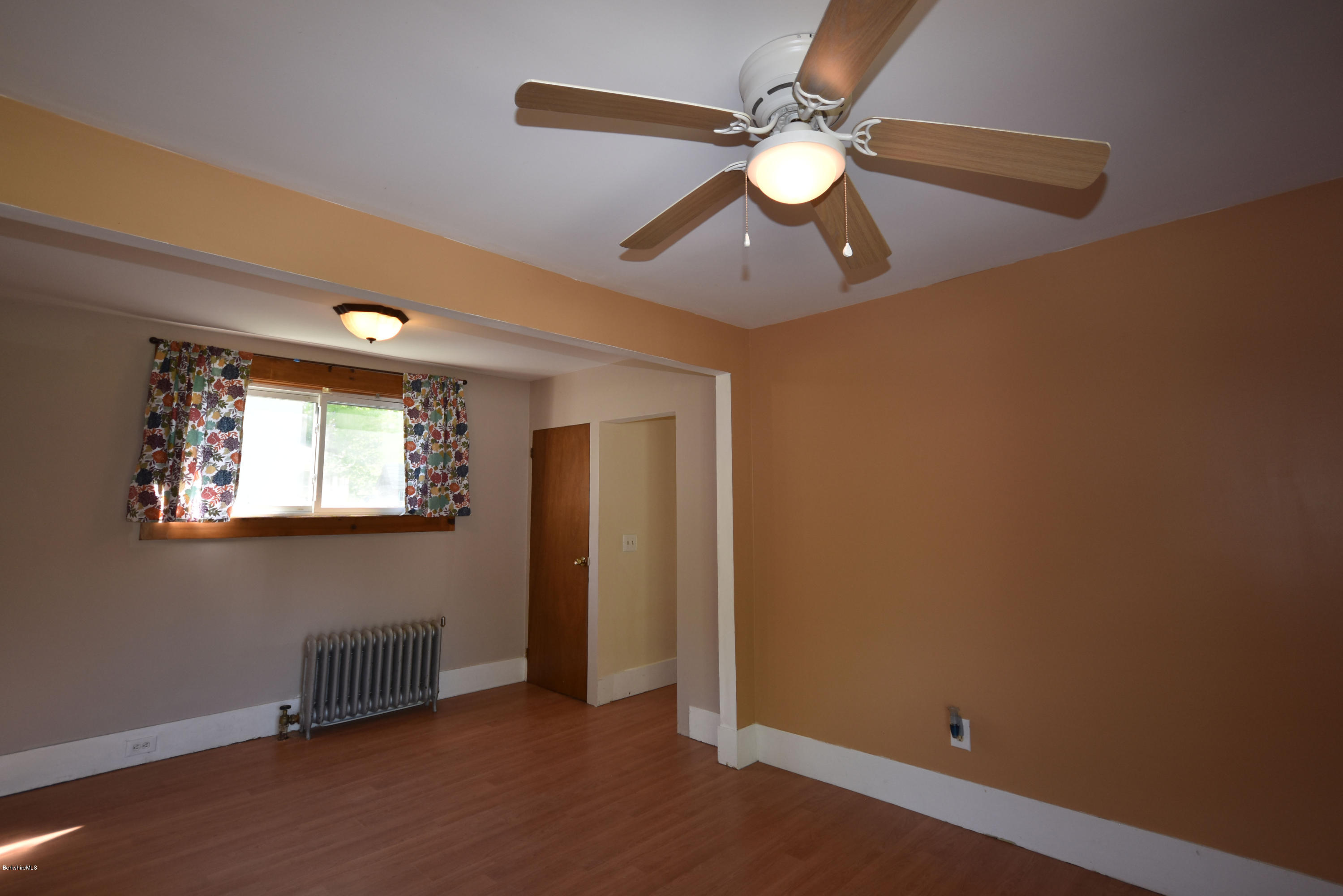 46 Berkley Street Pittsfield, MA 01201 - Photo 13 of 42 an empty room with windows and fan