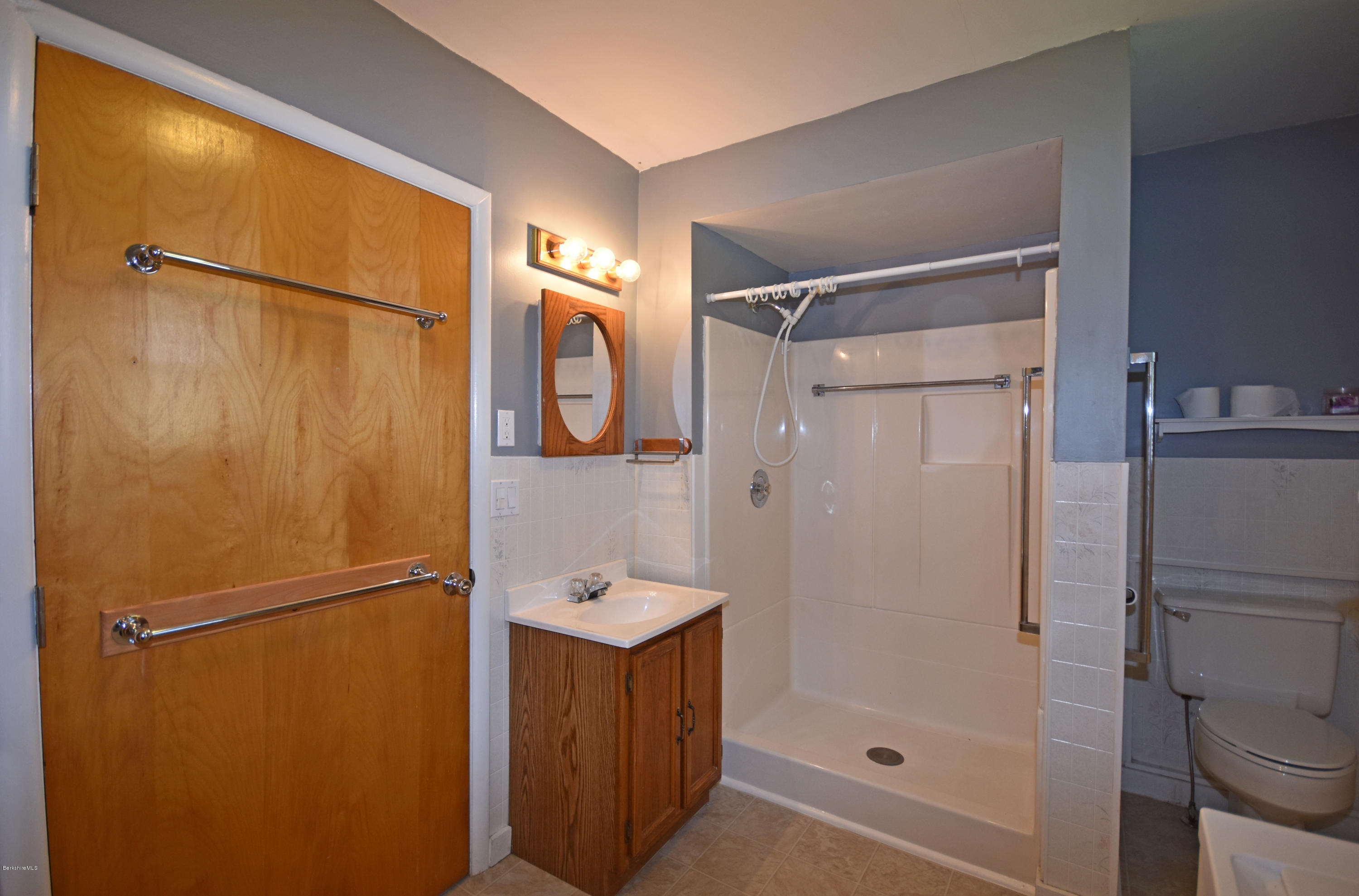 46 Berkley Street Pittsfield, MA 01201 - Photo 19 of 42 a bathroom with a shower and a sink