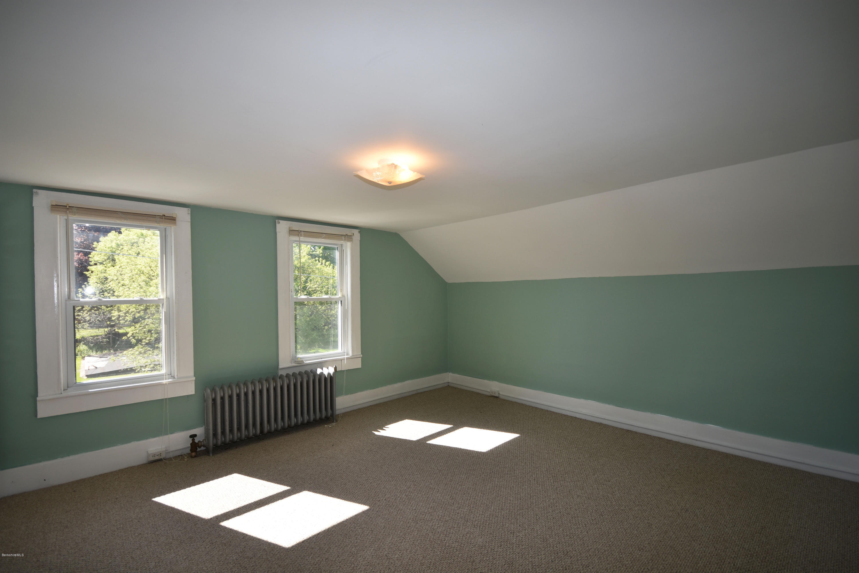 46 Berkley Street Pittsfield, MA 01201 - Photo 22 of 42 a view of empty room with window