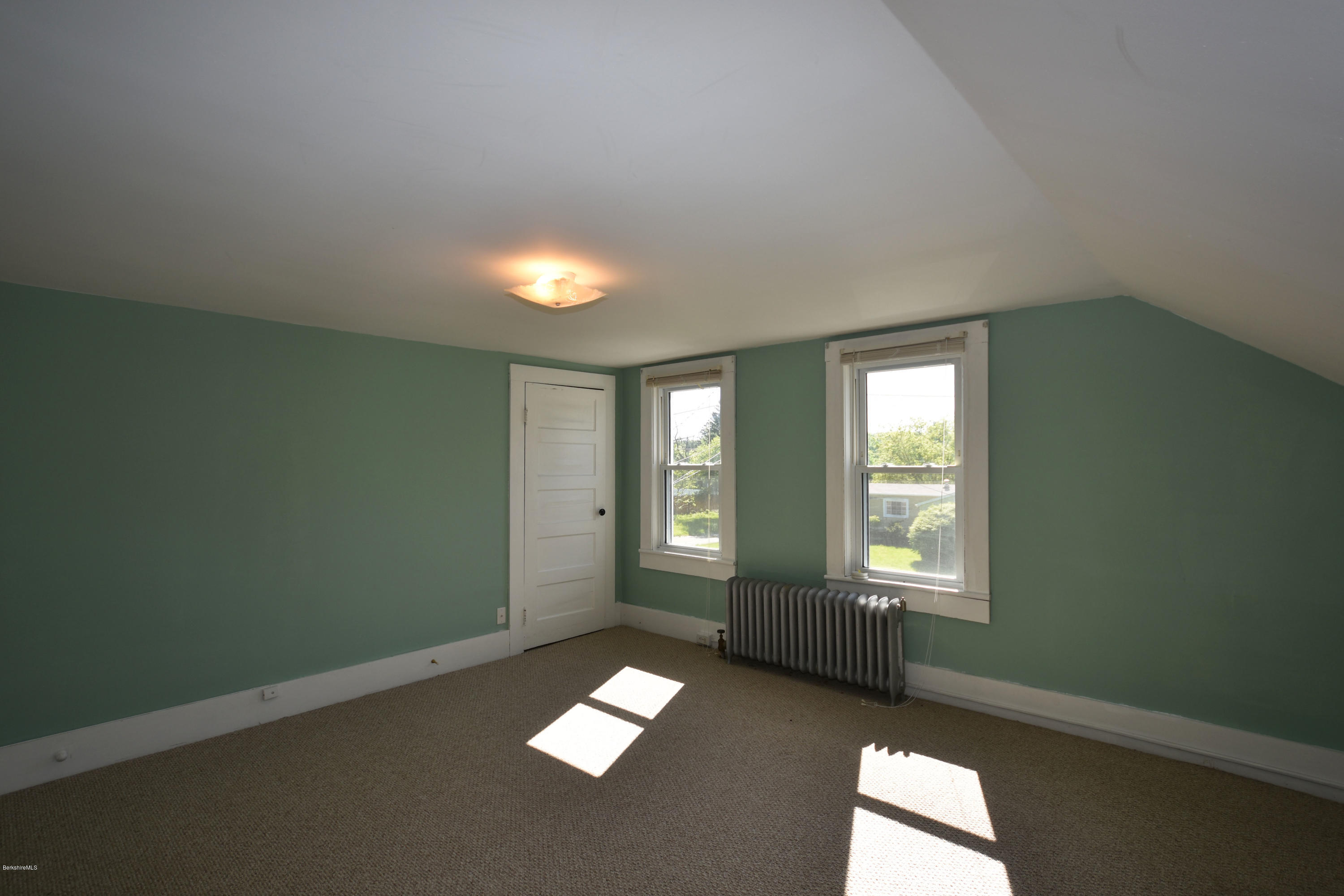 46 Berkley Street Pittsfield, MA 01201 - Photo 23 of 42 an empty room with windows