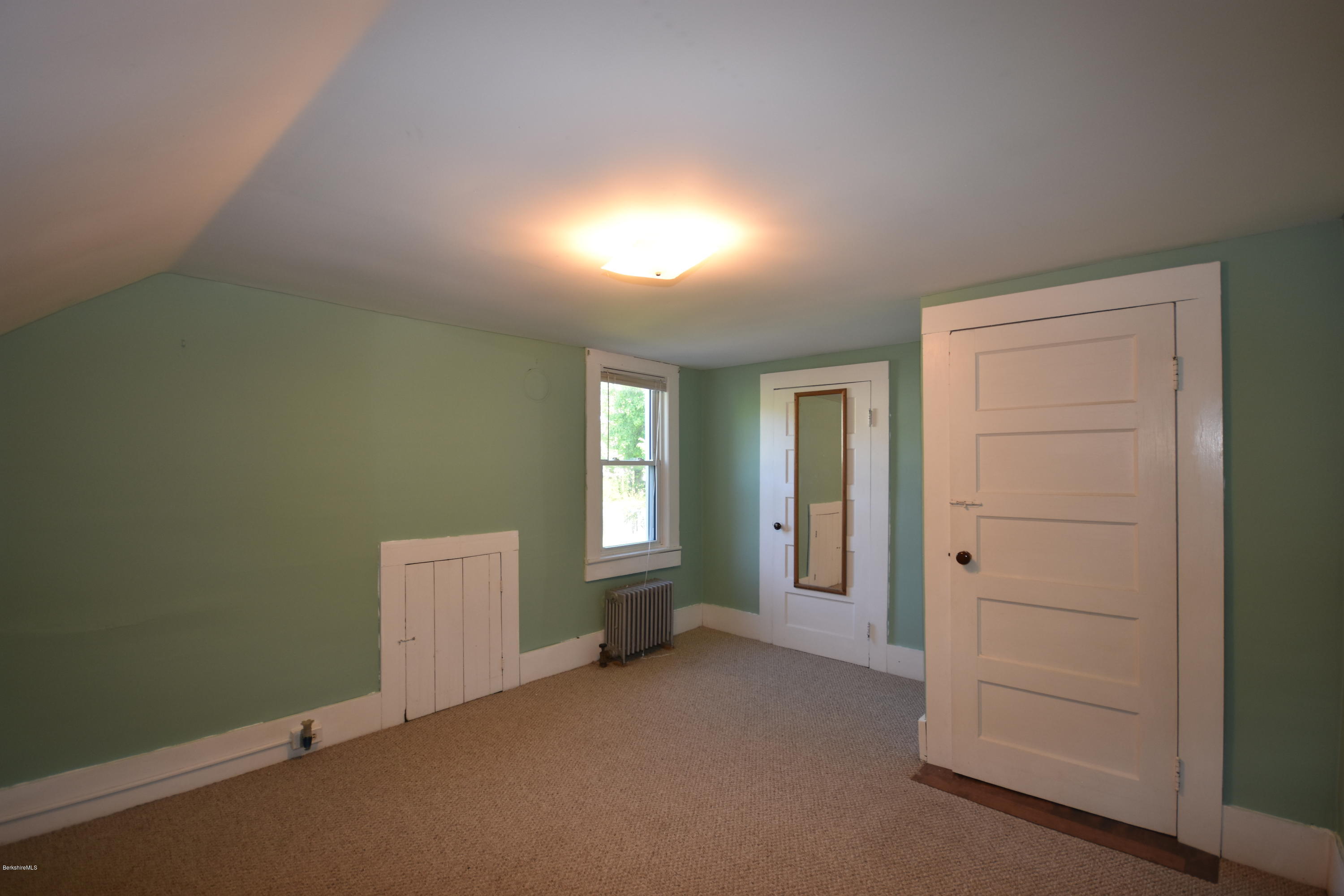 46 Berkley Street Pittsfield, MA 01201 - Photo 26 of 42 an empty room with windows and closet
