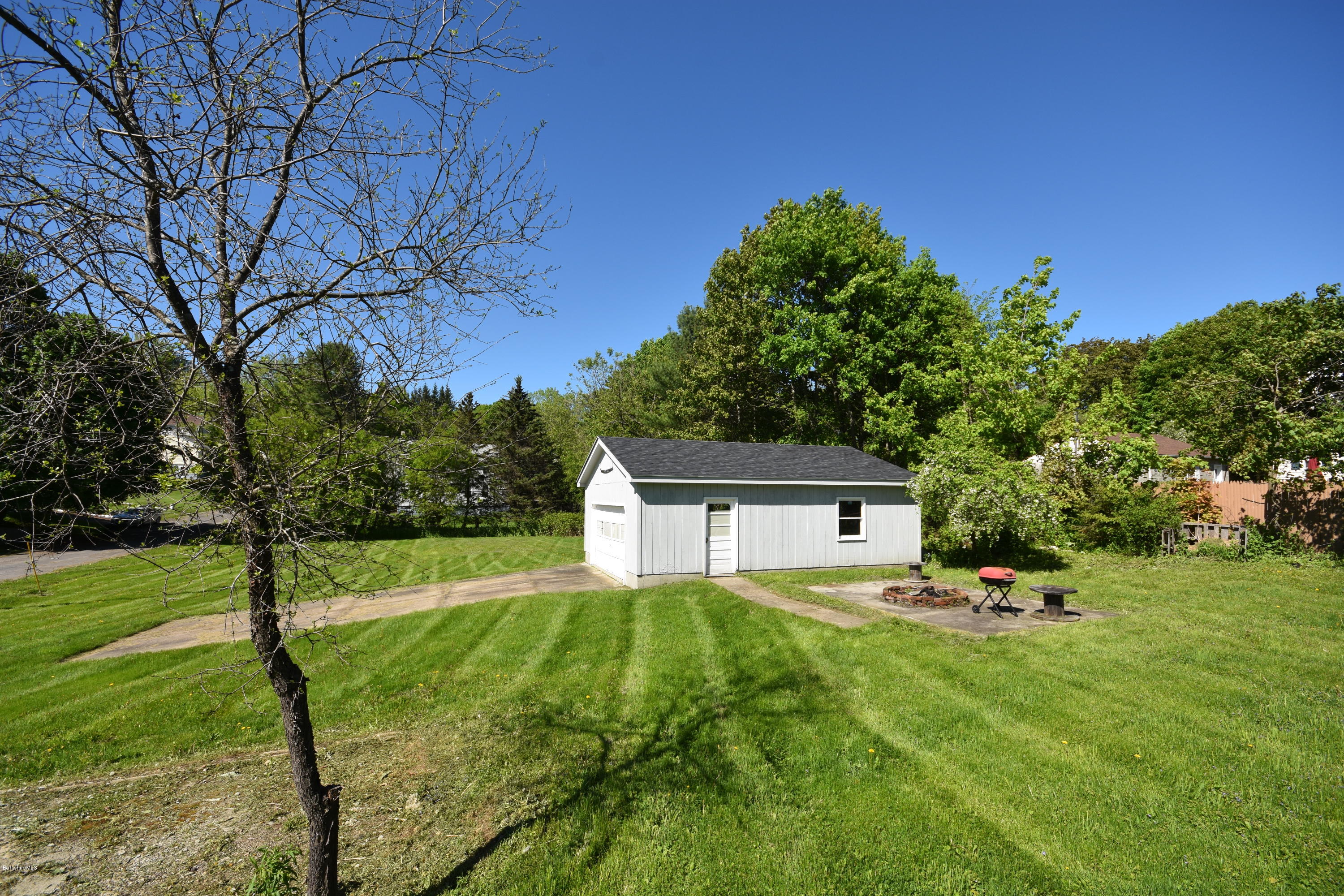 46 Berkley Street Pittsfield, MA 01201 - Photo 41 of 42 a house view with a play ground in front of it