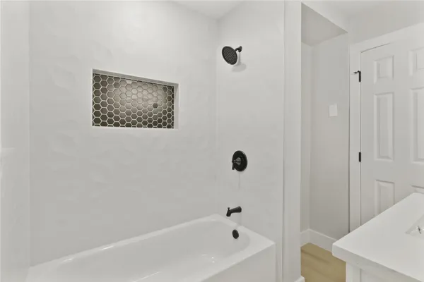 a bathroom with a bathtub