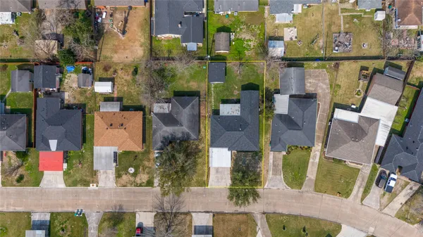 aerial view of residential houses with outdoor space