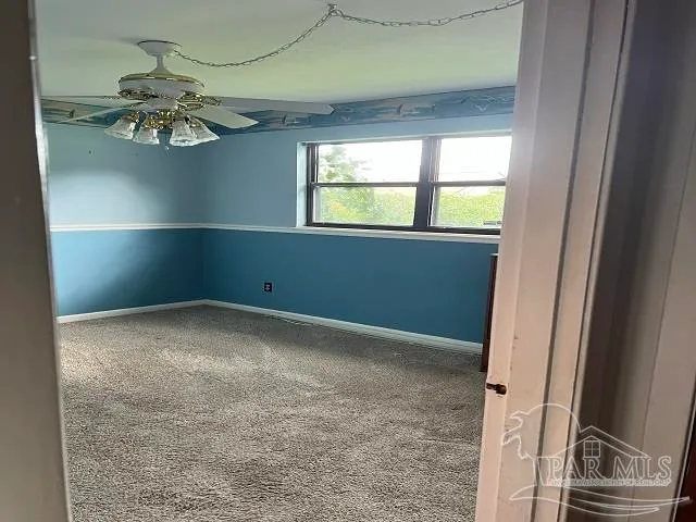 view of empty room with window