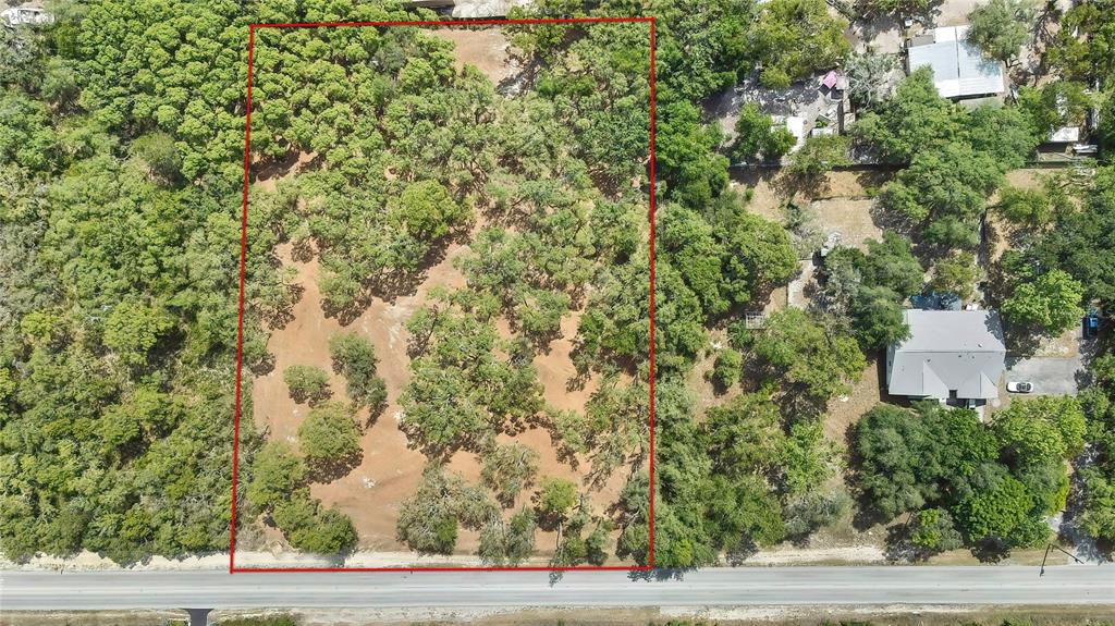 Hicks Road Hudson, FL 34669 - Photo 3 of 10 a view of a yard