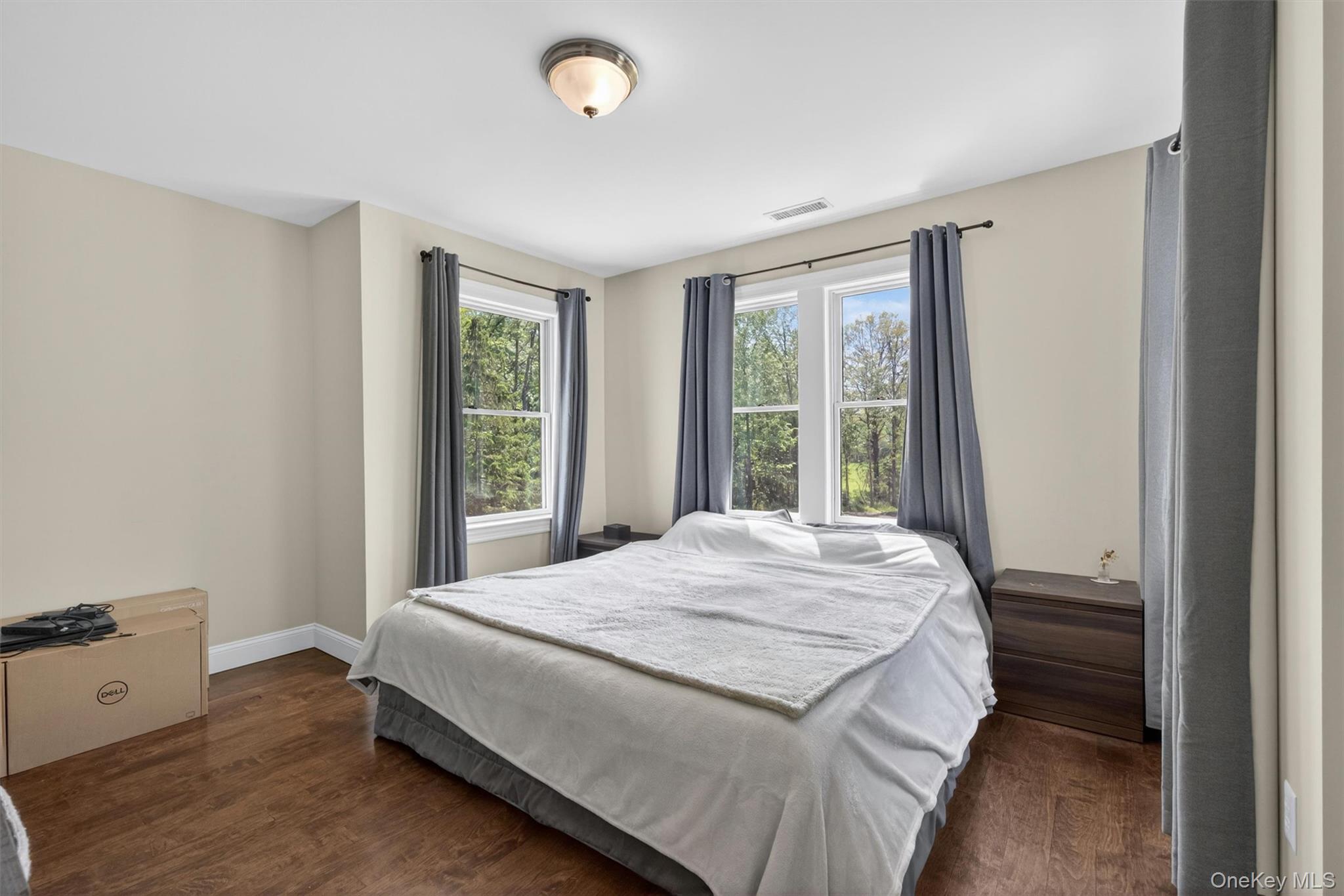 28 Bethlehem Road New Windsor, NY 12553 - Photo 40 of 50 a bed sitting in a spacious bedroom next to a window