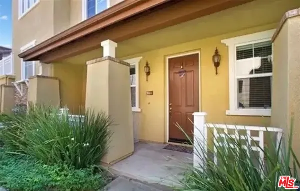front view of a house with a small yard
