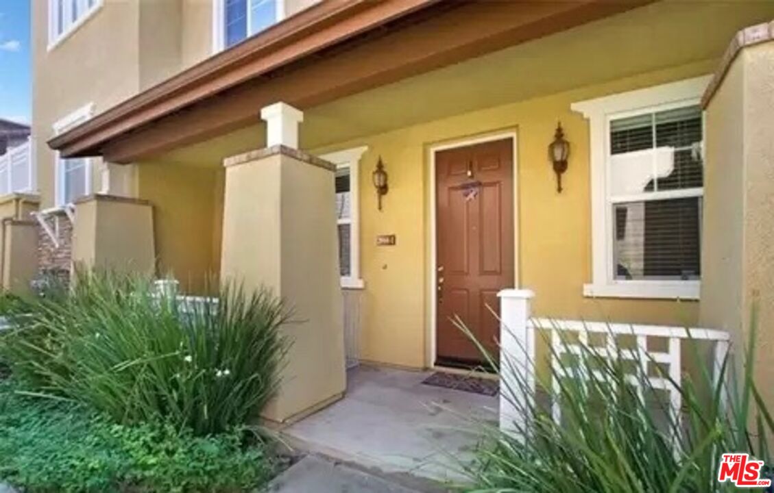 3944 Polk Street, Unit E Riverside, CA 92505 - Photo 2 of 21 front view of a house with a small yard