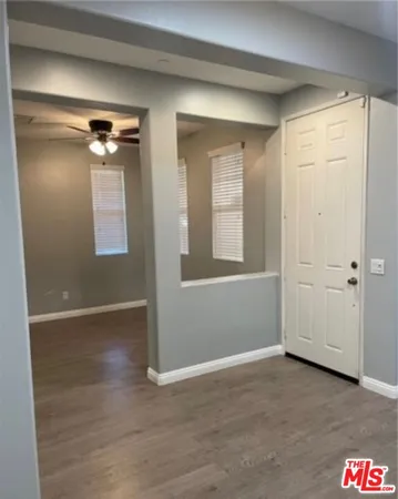 a kitchen with stainless steel appliances a refrigerator and a stove