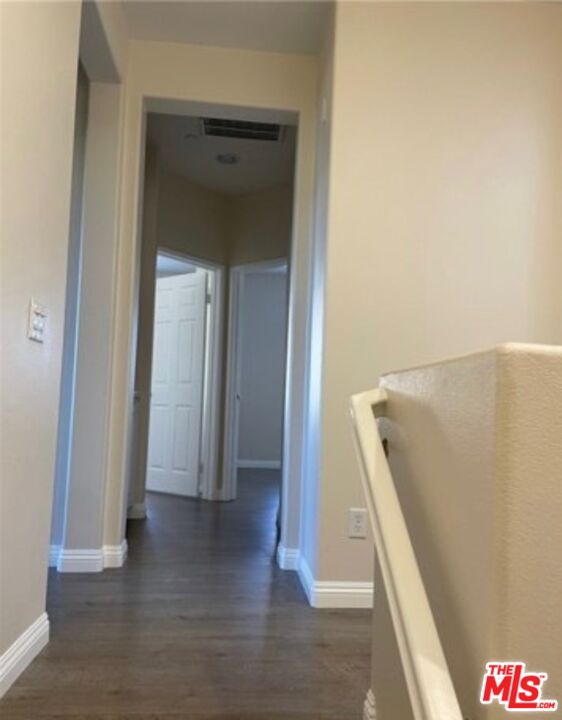 3944 Polk Street, Unit E Riverside, CA 92505 - Photo 8 of 21 a view of hallway with wooden floor