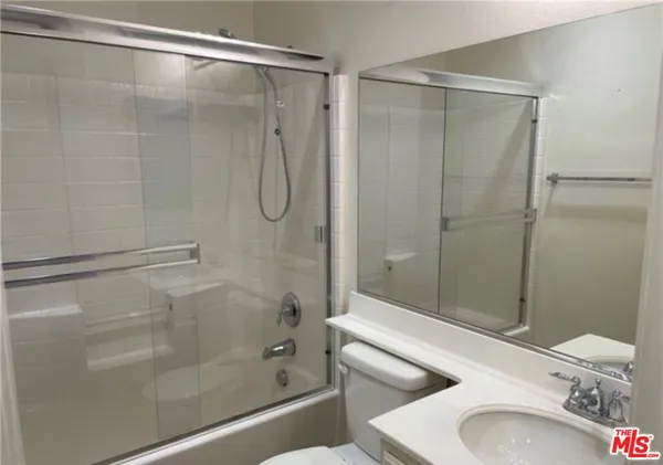 a bathroom with a sink and a bathtub