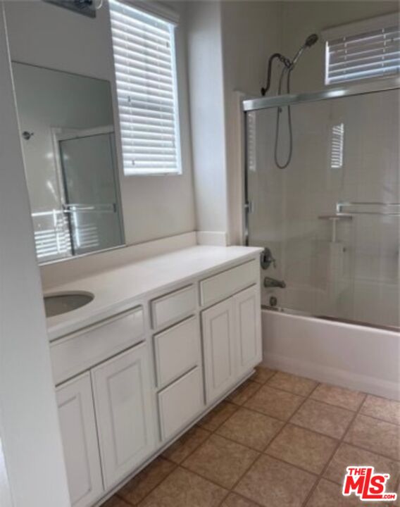 3944 Polk Street, Unit E Riverside, CA 92505 - Photo 10 of 21 a bathroom with a sink and a bathtub